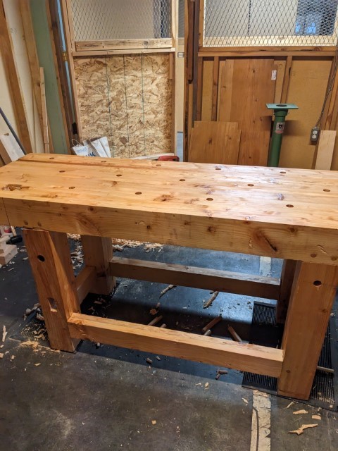 The workbench with a layer of tung oil applied. It looks shinier than when it was unfinished.
